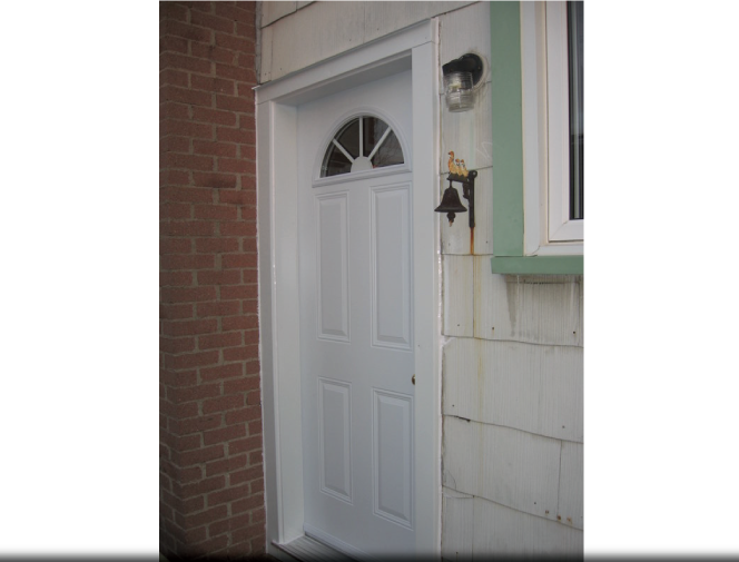 New back entrance with half moon window.