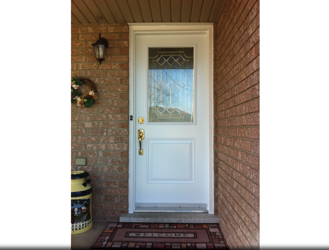 New front entrance with beautiful glass insert.
